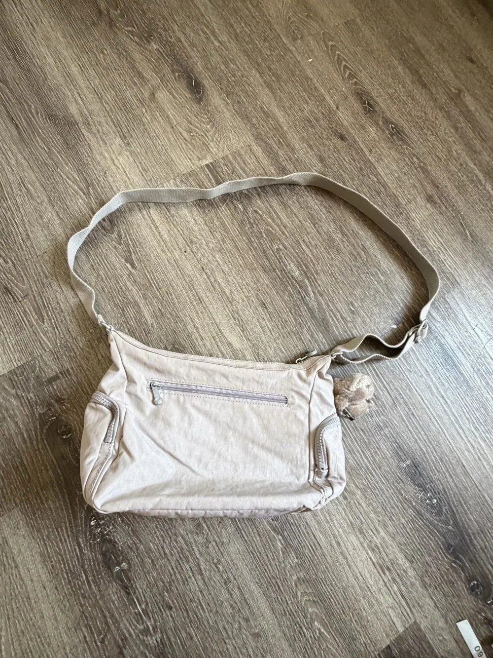 Kipling Light Beige Crossbody Bag with Multiple Zips
